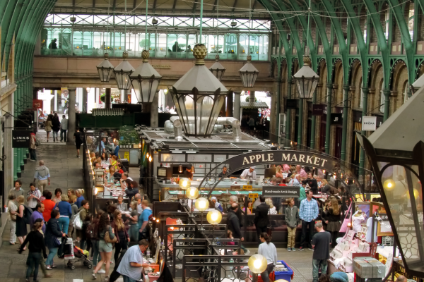 Aerial view of the inside of Covenet Garden in London with people.